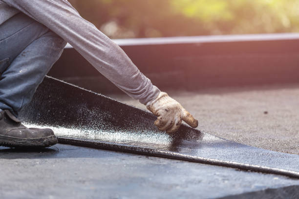 Professional Basement Waterproofing technician working in Lynchburg, OH